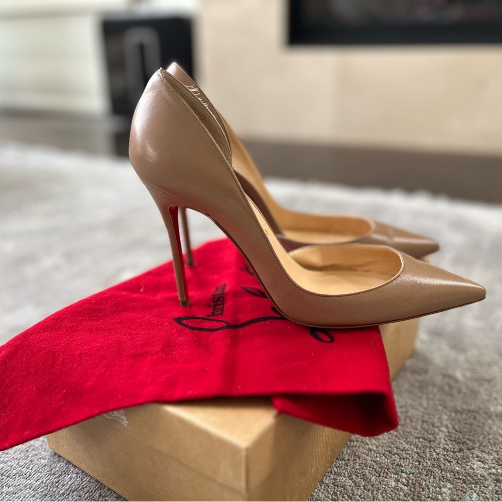 Nude leather Iriza louboutins. Timeless classic